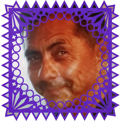Photo of Jose Pepe Andrade in a frame with papel picado.