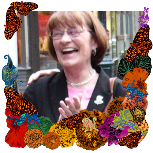 Photo of My sister in a frame with marigolds, flowers, alebrijes and monarch butterflies.