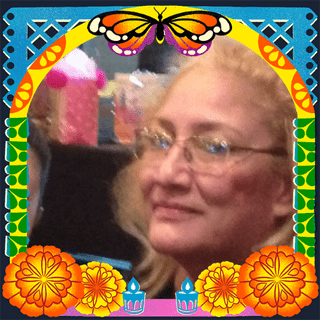Photo of Norma Moreno in an illustrated frame of blue and green papel picado, with a monarch butterfly, marigold flowers and candles.