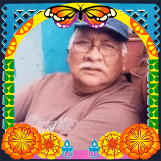 Photo of Papá Mino in an illustrated frame of blue and green papel picado, with a monarch butterfly, marigold flowers and candles.
