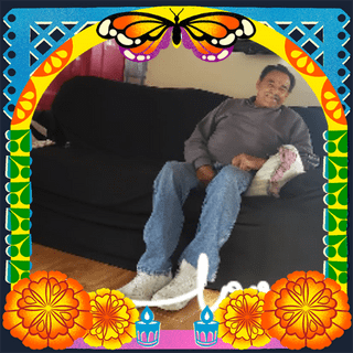 Photo of Rafa in an illustrated frame of blue and green papel picado, with a monarch butterfly, marigold flowers and candles.