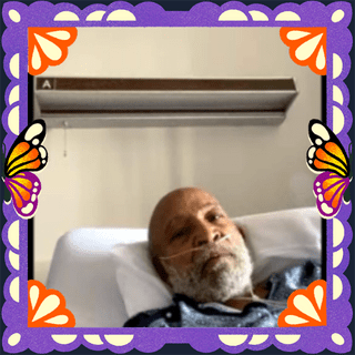 Photo of Larry Carr in an illustrated frame of purple papel picado, with monarch butterfly wings.