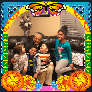 Photo of Roberto Ochoa in an illustrated frame of blue and green papel picado, with a monarch butterfly, marigold flowers and candles.