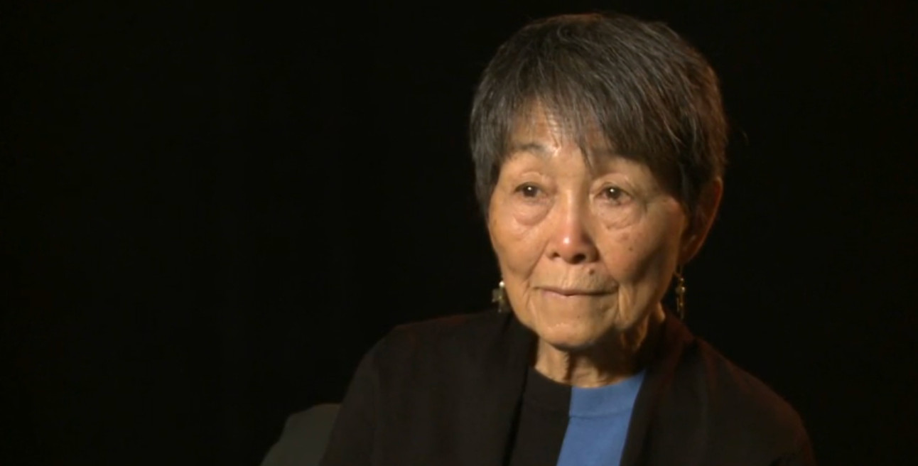 Portait of May Ohmura Watanabe listening to an interview question