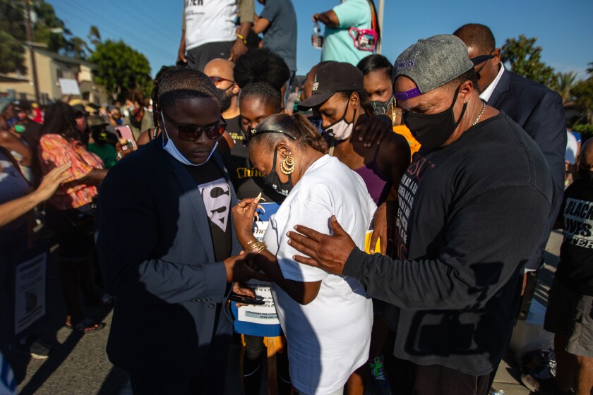 Protesters gather in South L.A. last year after deputies fatally shot Dijon Kizzee. Officers tried to stop Kizzee for riding his bike on the wrong side of the street.
