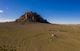 Bennett Peak towers above a Navajo hogan in rural northwestern New Mexico.