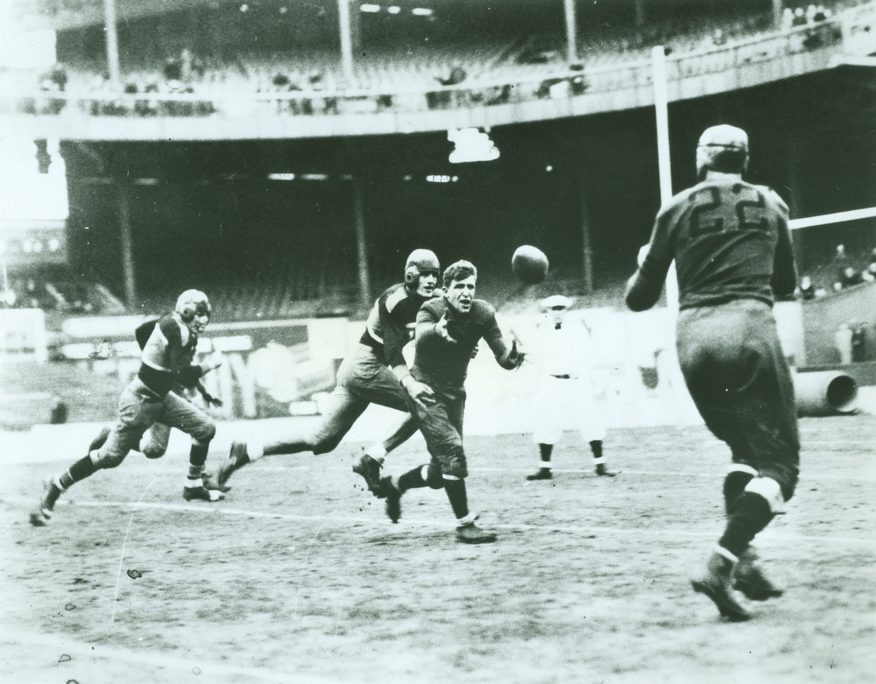The Chicago Bears defeat the New York Giants in the 1933 championship game.