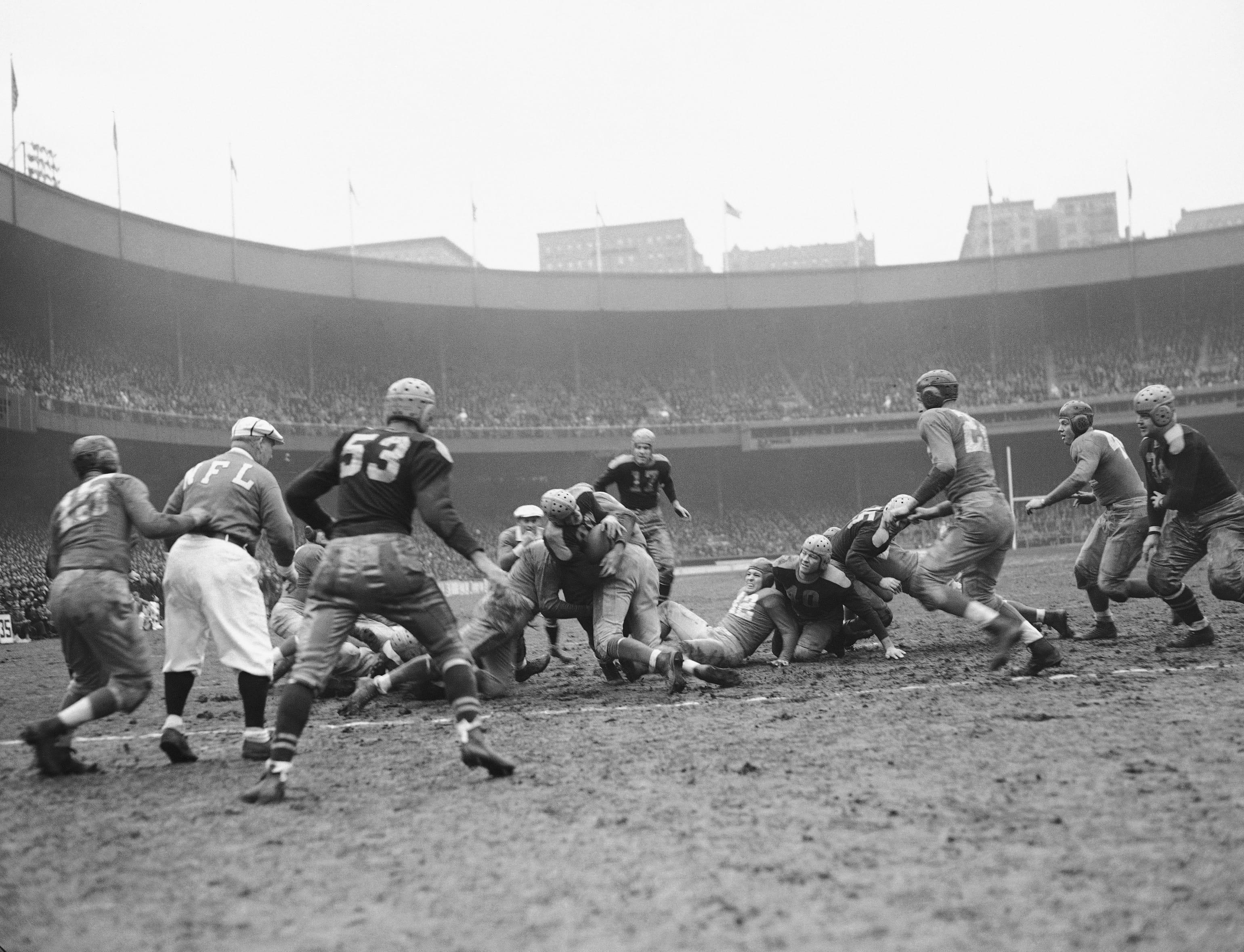 The Green Bay Packers and New York Giants play in the 1938 NFL championship game at the Polo Grounds in New York.