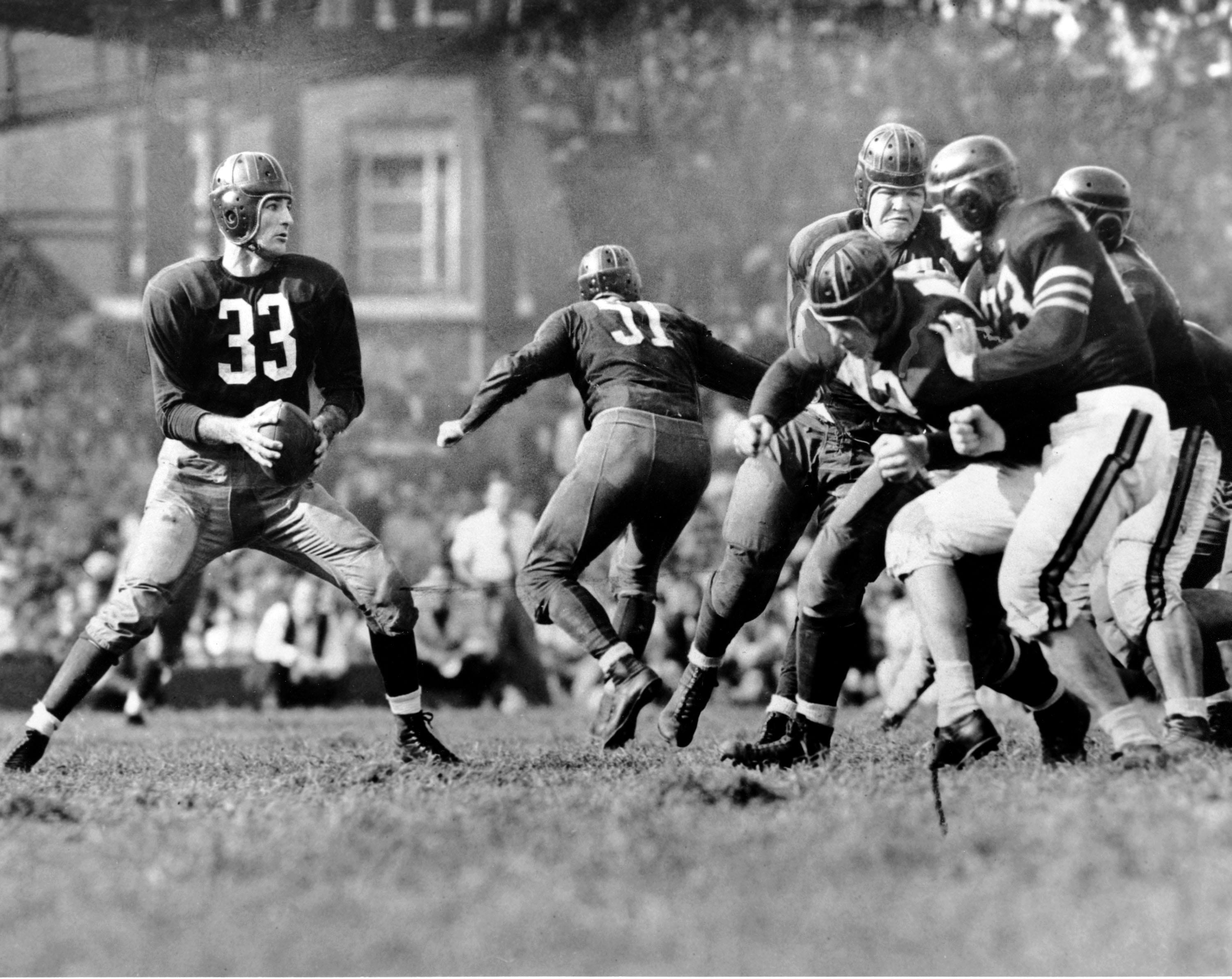 Washington Redskins' Sammy Baugh looks to pass during a game against the Chicago Bears in Sept. 1942.