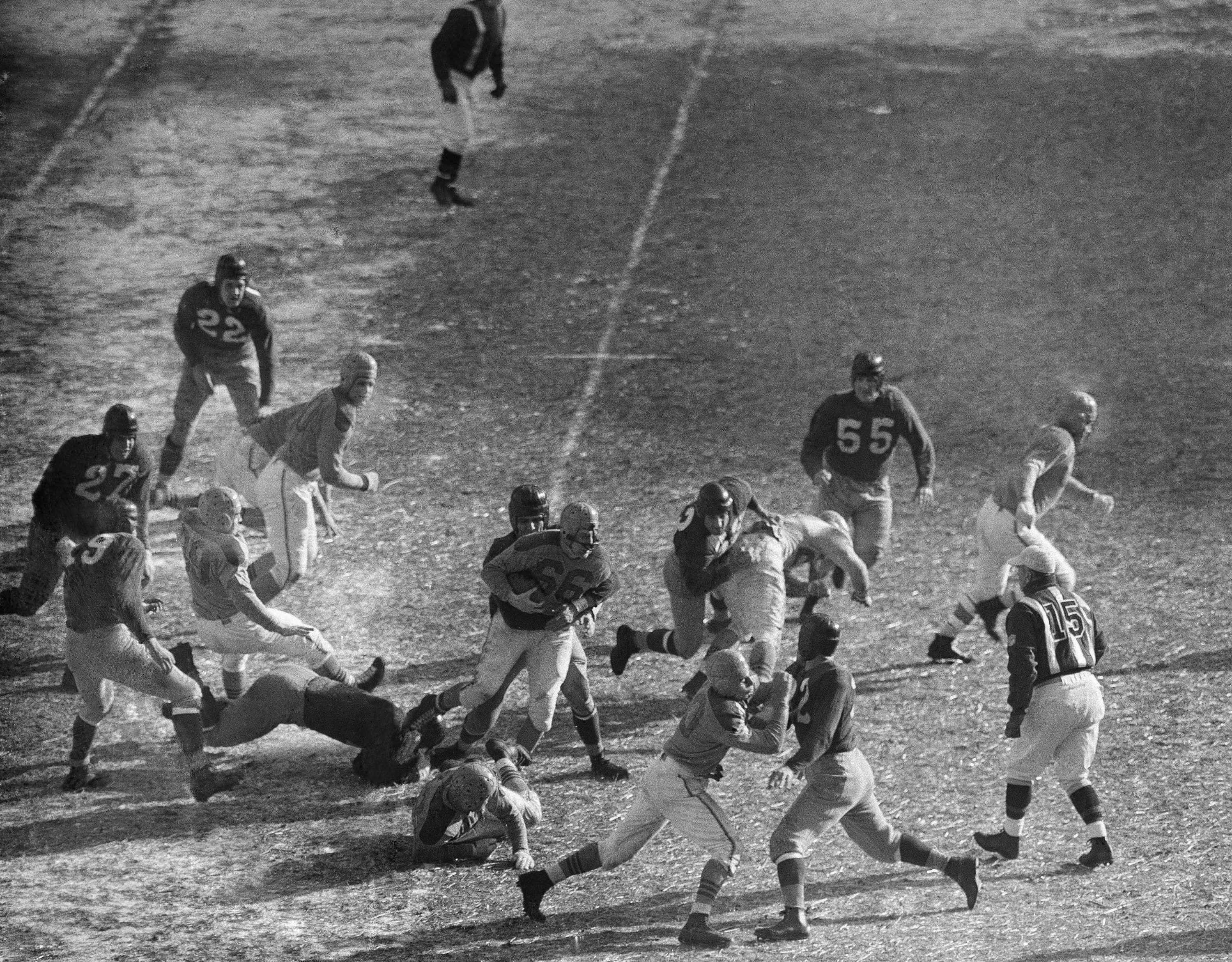 The Cleveland Rams and Washington Redskins play in the 1945 NFL title game.