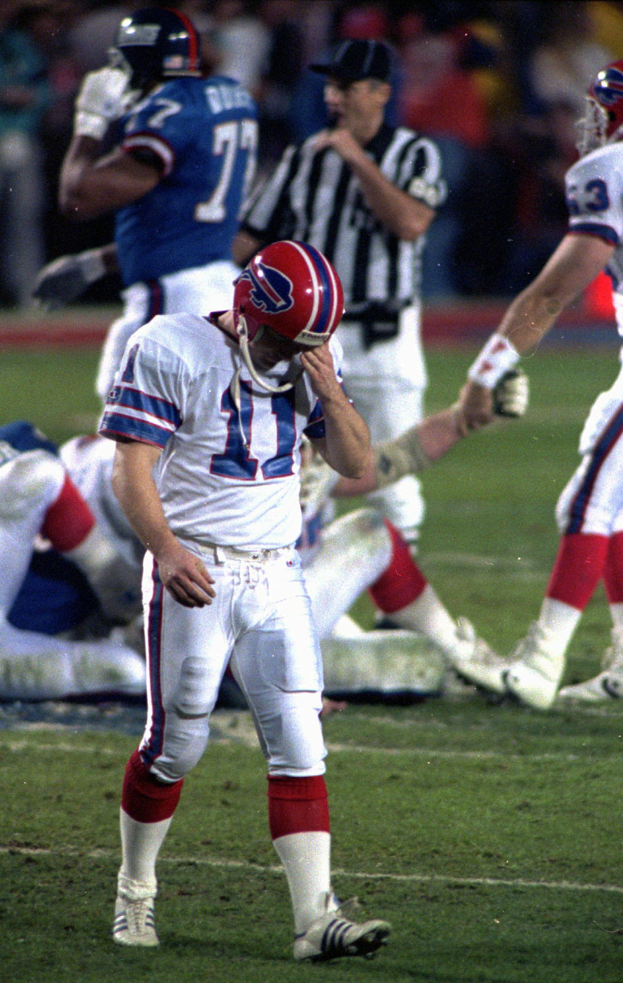 Buffalo Bills kicker Scott Norwood walks off after missing what would have been the winning field goal in Super Bowl XXV against the New York Giants.