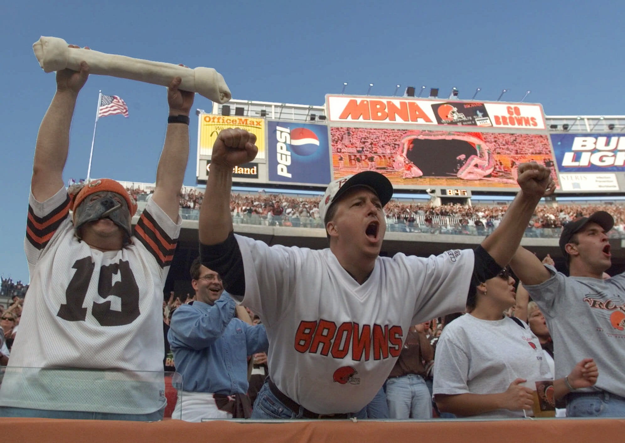 Cleveland Browns fans cheer during a preseason game in 1999.