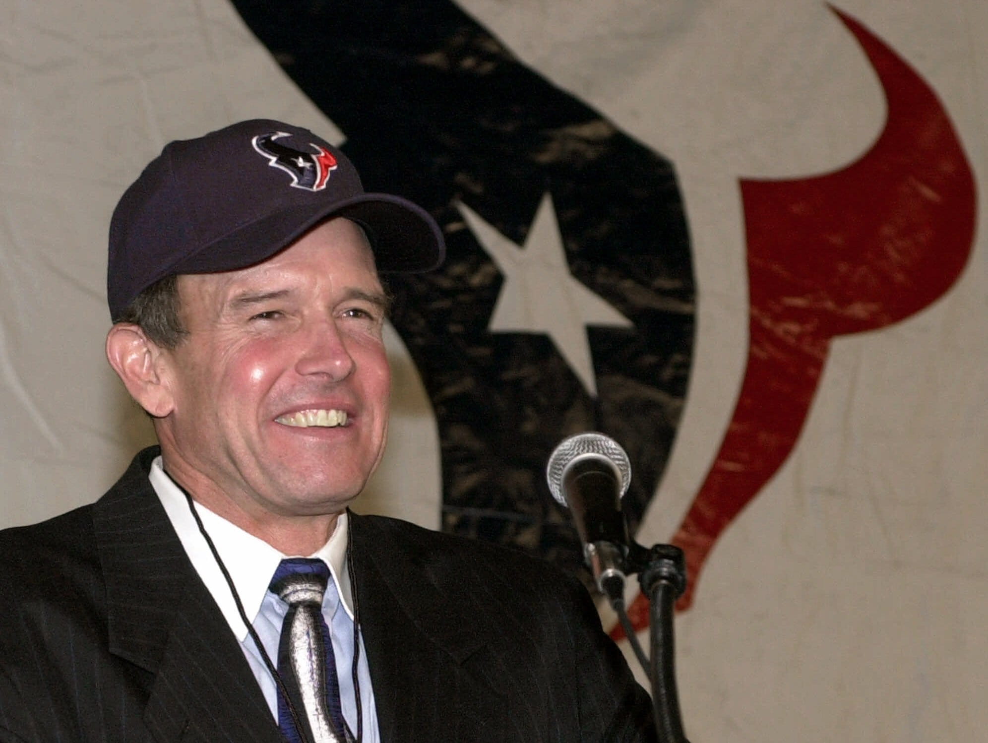 Dom Capers smiles after being introduced as the first coach of the Houston Texans in 2001.