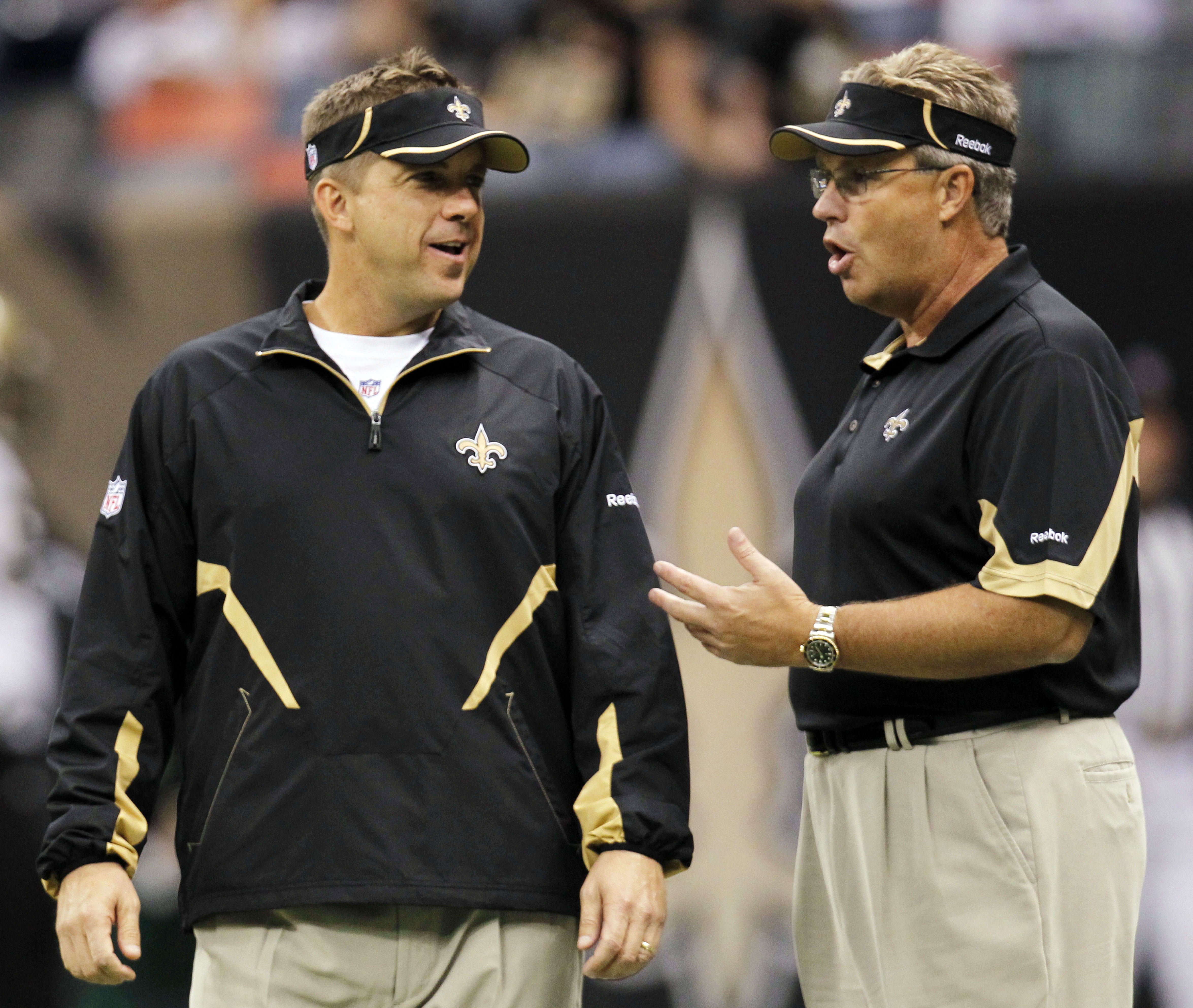 Saints coach Sean Payton and defensive coordinator Gregg Williams speak before a game in 2010.