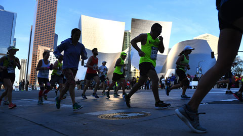 Marathon runners in front of the Walt Disney Concert Hall