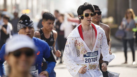 Elvis impersonator runs on Rodeo Drive