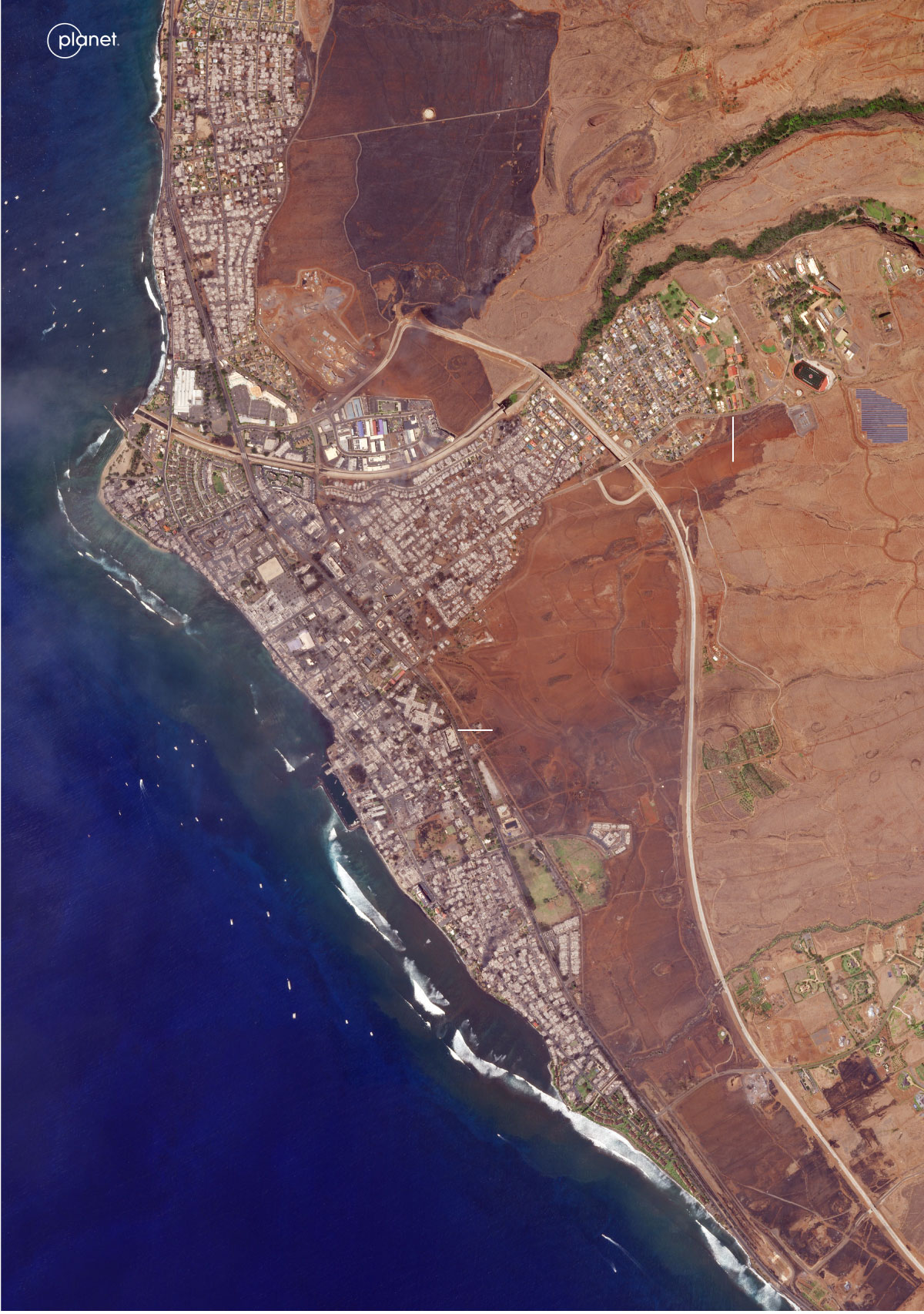 Satellite imagery captured on Aug. 9 shows burned buildings throughout the town of Lahaina