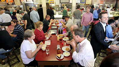 Chowing down at Philippe's. (Christina House / For The Times)