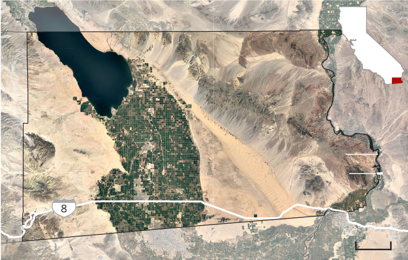 Satellite image of irrigated land surrounded by desert in Imperial County in relation to the Salton Sea, Interstate 8 and the borders with Mexico and Arizona.